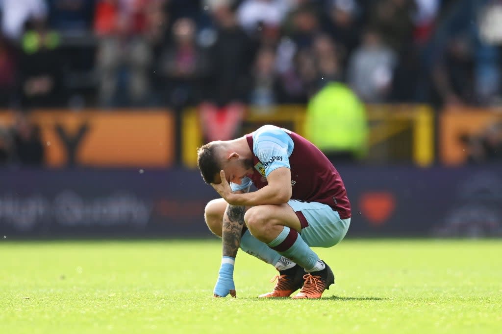 Turf war: Burnley have two games to save their Premier League status  (Getty)