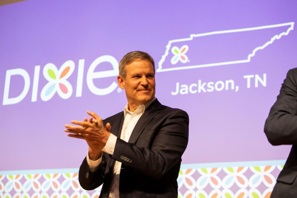 Governor Bill Lee claps during the Dixie Manufacturing groundbreaking reception in the McWherter Center Auditorium at Jackson State Community College on Friday, December 9, 2022. 