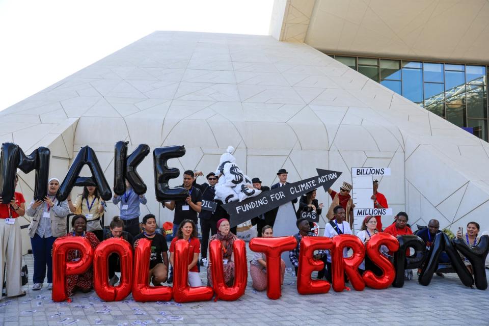 Climate activists protest during the Cop28 summit (REUTERS)