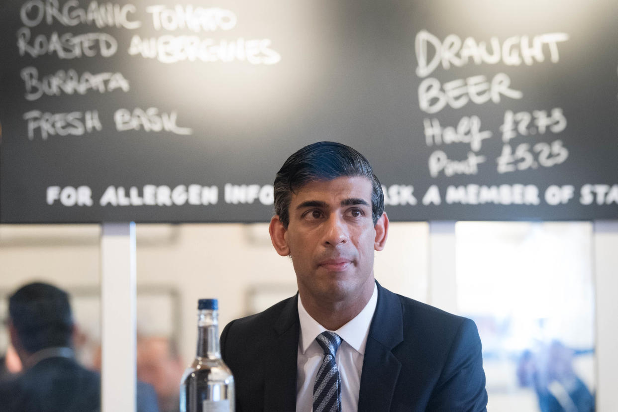 Britain's Chancellor of the Exchequer Rishi Sunak hosts a roundtable meeting for business representatives at a branch of the Franco Manca chain pizza restaurant in London on October 22, 2020. - The Chancellor announced on October 22 a new support package for businesses affected by Tier 2 coronavirus restrictions, the 'high' alert level which effects places like London and Birmingham, which include subsidies for pubs and restaurants. (Photo by Stefan Rousseau / POOL / AFP) (Photo by STEFAN ROUSSEAU/POOL/AFP via Getty Images)