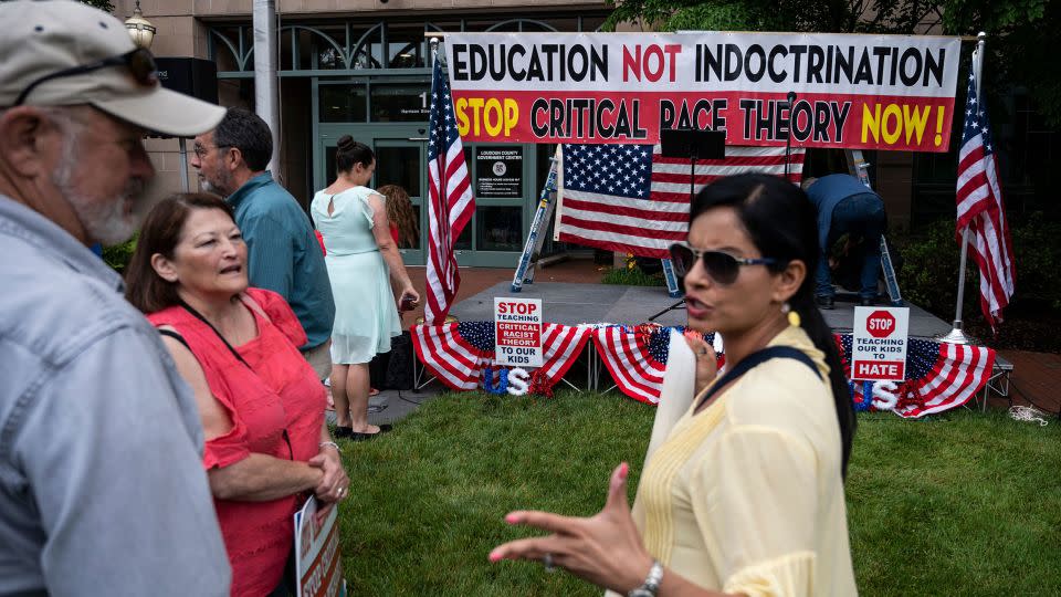 Parents at a Virginia rally opposing critical race theory. Conservatives have changed this once obscure academic study into a hot-button political slur. - Andrew Caballero-Reynolds/AFP/Getty Images