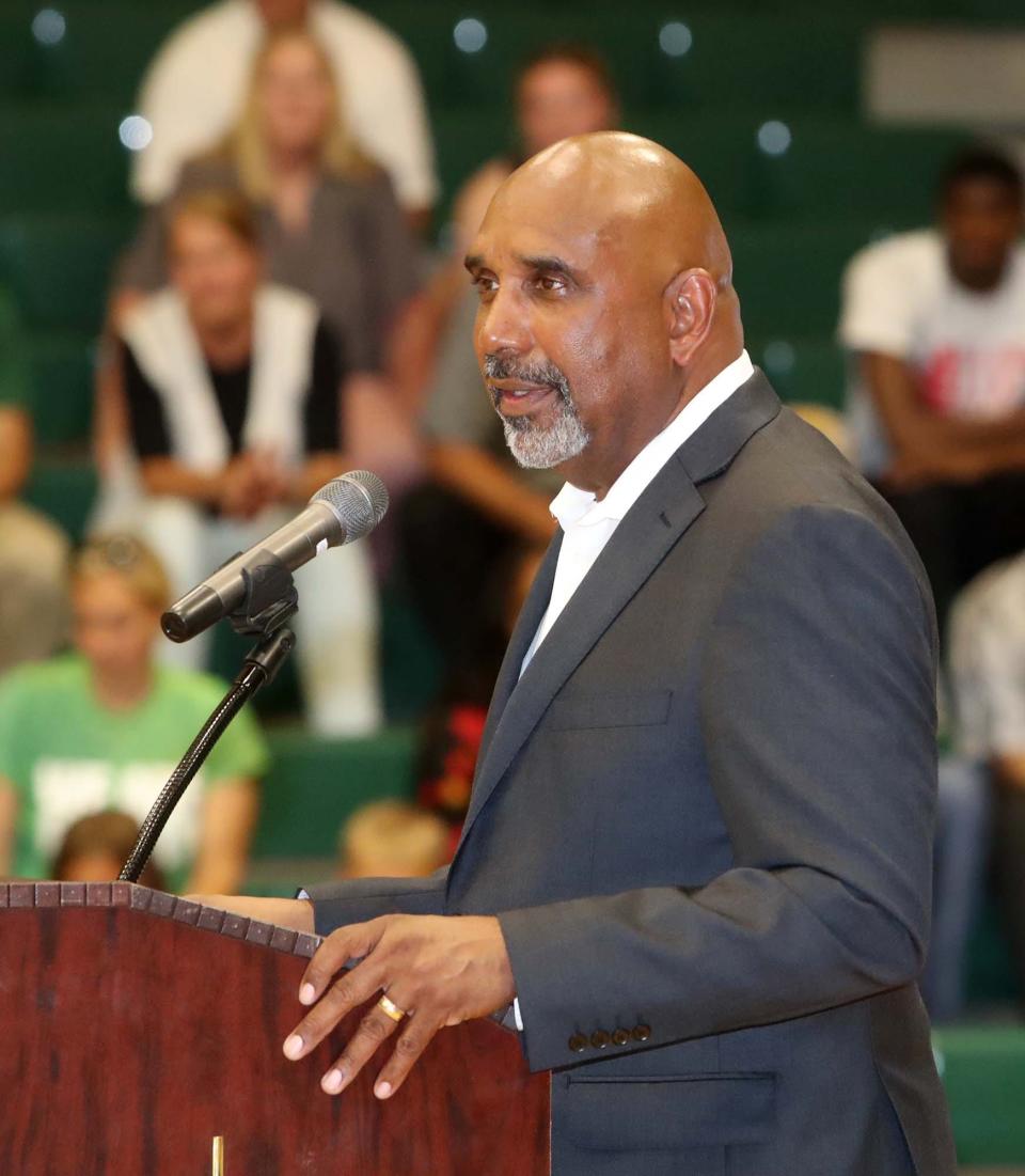 Dru Joyce II, the head boys basketball coach at St. Vincent-St. Mary High School, speaks Sunday during the court dedication ceremony at the school's LeBron James Arena in Akron.