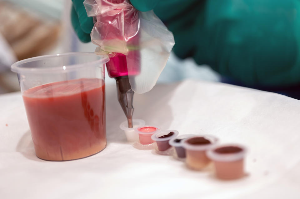 Caitlin Giles, a physician assistant at Memorial Sloan Kettering Cancer Center, uses a mix of ink colors to create a tattoo for each patient's skin tone. (Courtesy Memorial Sloan Kettering )