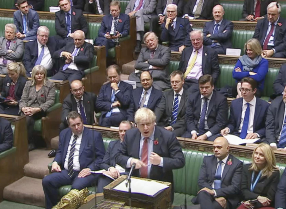 In this image taken from video British Prime Minister Boris Johnson speaking in the House of Commons, London, Tuesday Oct. 29, 2019. Britain is on course for a December general election after Jeremy Corbyn announced that Labour's conditions to back the move had been met. (House of Commons via AP)