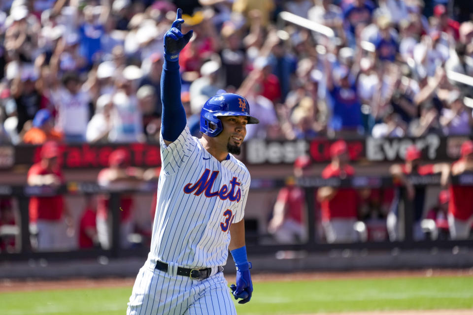 New York Mets' Rafael Ortega reacts after hitting a walk off single during the ninth inning of a baseball game against the Los Angeles Angels, Sunday, Aug. 27, 2023, in New York. The Mets won 3-2. (AP Photo/Mary Altaffer)