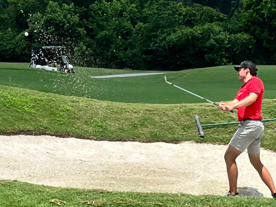 Will Davis blasts out of a bunker fronting the 14th green of the San Jose Country Club on Saturday. He tapped in for a birdie after the shot and never lost his lead on the way to winning the Jacksonville Area Golf Association Amateur Championship.