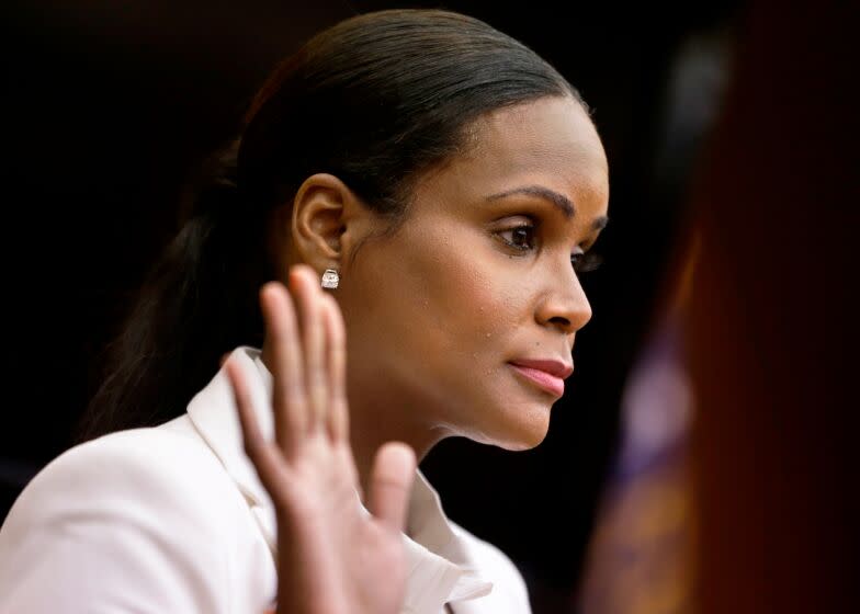 FILE - Tameka Foster Raymond takes the witness stand during a child custody hearing with her ex-husband, R&B singer Usher, Aug. 9, 2013, in Atlanta. Foster is calling to drain Lake Lanier, Georgia's largest lake, where her son was fatally injured 11 years ago. Kile Glover, her 11-year-old son with Bounce TV chairman Ryan Glover, died in July 2012 after a personal watercraft struck the boy as he floated in an inner tube on the lake. (AP Photo/David Goldman, File)