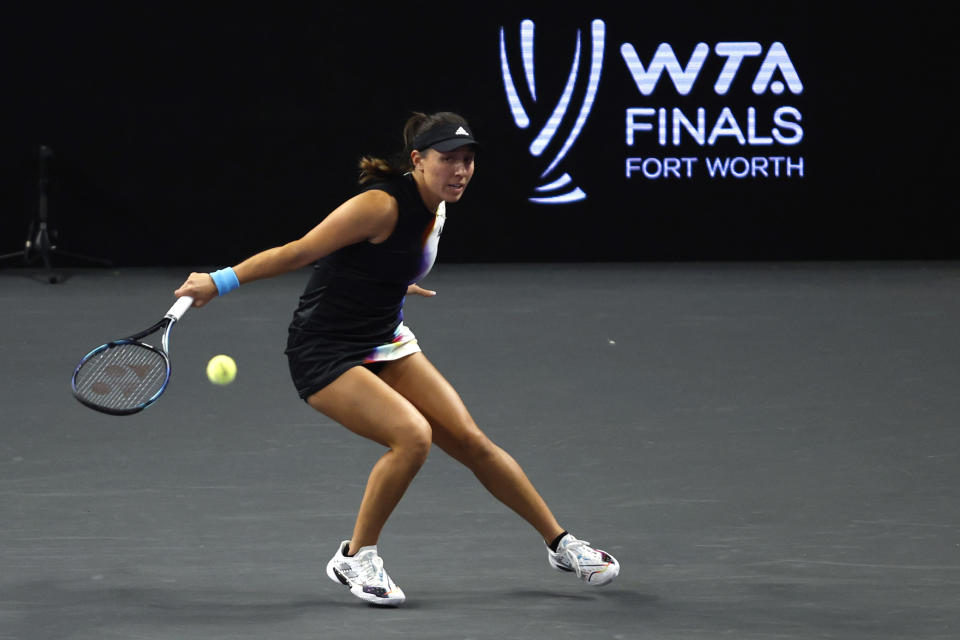 Jessica Pegula returns a shot to Ons Jabeur of Tunisia during round-robin play on day three of the WTA Finals tennis tournament in Fort Worth, Texas, Wednesday, Nov. 2, 2022. (AP Photo/Tim Heitman)
