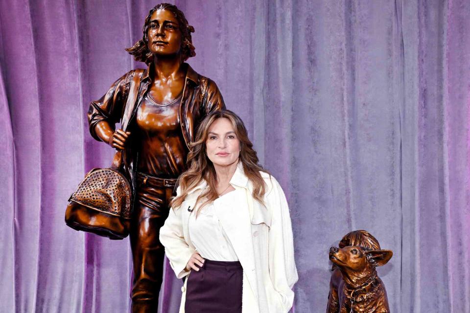 <p>MOVI Inc</p> Mariska Hargitay with the "Courageous Together" statue by Kristen Visbal