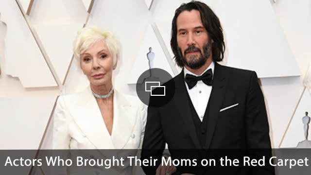 Patricia Taylor, left, and Keanu Reeves arrive at the Oscars on Sunday, Feb. 9, 2020, at the Dolby Theatre in Los Angeles. (Photo by Richard Shotwell/Invision/AP)