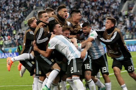 Soccer Football - World Cup - Group D - Nigeria vs Argentina - Saint Petersburg Stadium, Saint Petersburg, Russia - June 26, 2018 Argentina's Marcos Rojo celebrates scoring their second goal with team mates REUTERS/Henry Romero