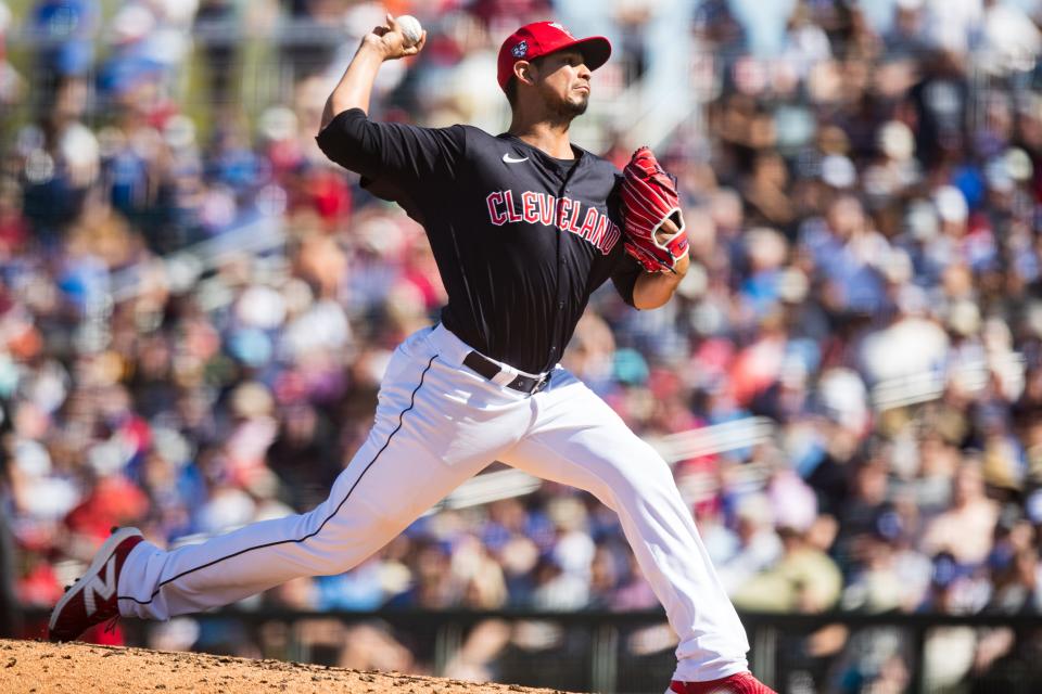 GOODYEAR, ARIZONA - MARCH 11: Carlos Carrasco #59 of the Cleveland Guardians pitches during the fifth inning of the Spring Training Game against the Los Angeles Dodgers at Goodyear Ballpark on March 11, 2024 in Goodyear, Arizona. (Photo by John E. Moore III/Getty Images)