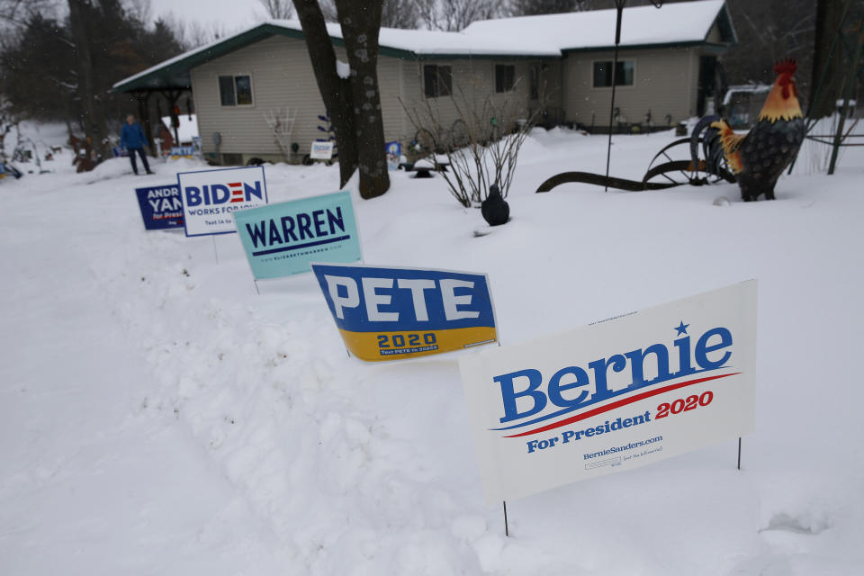 WAVERLY, IA - JANUARY 25: Yard signs for Andrew Yang, Joe Biden, Elizabeth Warren, Pete Buttigieg, and Bernie Sanders are seen in Jim Monaghan's front yard in Waverly, IA on Jan. 25, 2020. All across this frozen, snow-covered state, folks are grinding their teeth and griping to one another about the inescapable onslaught of text messages, TV ads, and mailboxes stuffed with political literature. The campaign phone calls have been endless. Social media feeds are so jammed with messaging that it can be impossible to scroll through family photos on Facebook without enduring the pleading overtures of the various Democratic hopefuls. Its only grown worse as next Mondays caucus approaches.