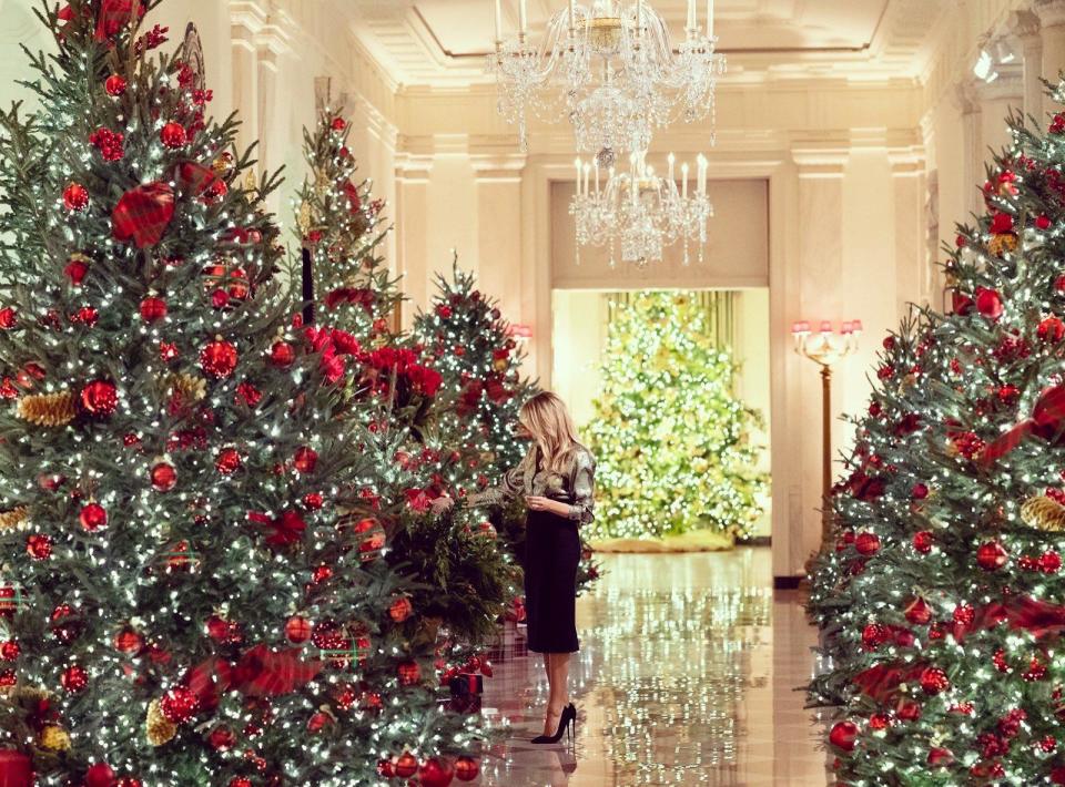 First lady Melania Trump amid the decorated Christmas trees at the White House, in a photo released Nov. 30, 2020. / Credit: White House Photo