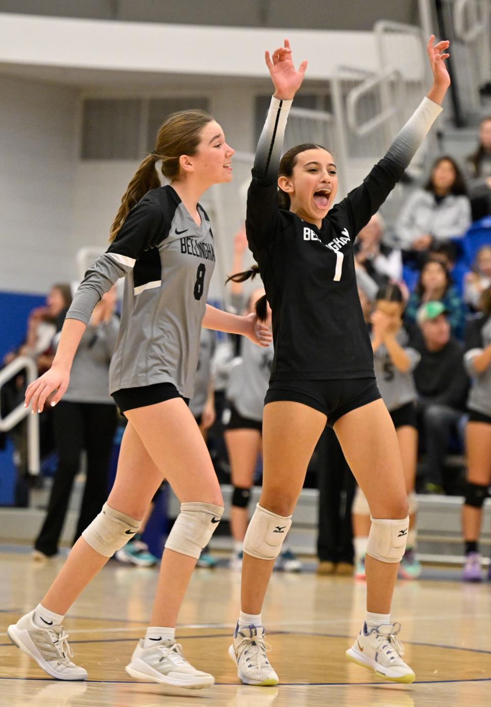 Bellingham sophomore Valerie Nolan and Bellingham freshman Sophia Soto celebrate a point during the Division 4 state championship game versus Ipswich at Worcester State, Nov. 18, 2023. at Worcester State gym. Ipswich defeated Wellington, 3-2. David Sokol-Milford Daily News