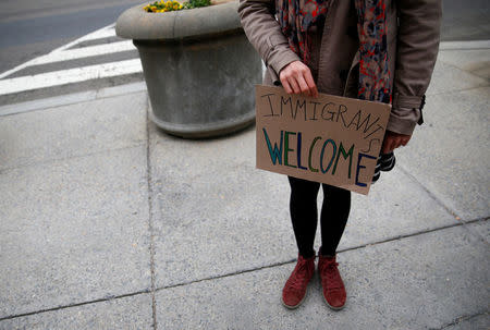 Immigration activists, including members of the DC Justice for Muslims Coalition, rally against the Trump administration's new ban against travelers from six Muslim-majority nations, outside of the U.S. Customs and Border Protection headquarters in Washington, U.S., March 7, 2017. REUTERS/Eric Thayer