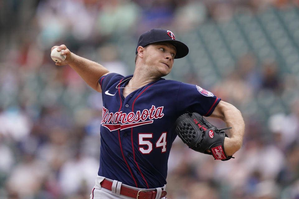 Minnesota Twins starting pitcher Sonny Gray throws during the first inning of a baseball game against the Detroit Tigers, Sunday, July 24, 2022, in Detroit. (AP Photo/Carlos Osorio)