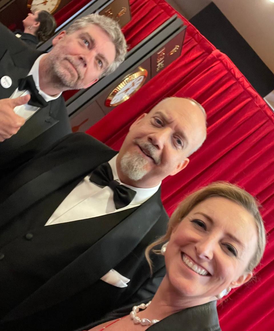Best Actor nominee Paul Giamatti, center, joins Portsmouth couple Chris Stinson, left, and Amy Greene of "The Holdovers" production team at the Oscars Sunday, March 10, 2024.