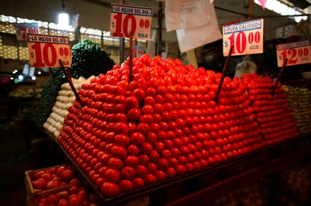 FILE PHOTO: Tomatoes are displayed at a vegetable stall in La Merced market, downtown Mexico City