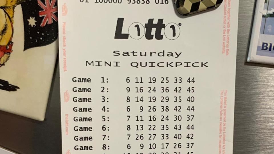 A Sydney mum says her children will be able to “grow up safe and happy” after she discovered a $2 million dollar lotto ticket stuck to her fridge. Picture: Supplied