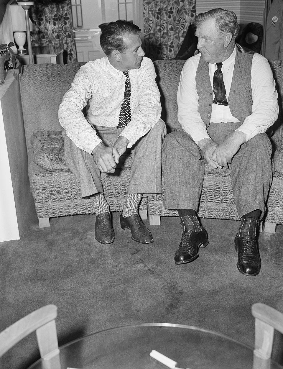 FILE—In this file photo from July 1, 1941, actor Gary Cooper, left, who played the title role in the movie "Sergeant York," talks with Sgt. Alvin York, on whose life the movie was based, at a New York hotel. The claim in Pennsylvania state Sen. Doug Mastriano's 2014 book about York, that a 1918 U.S. Army Signal Corps photo was mislabeled and actually shows York with three German officers he captured, has been disputed by rival researchers. (AP Photo, File)