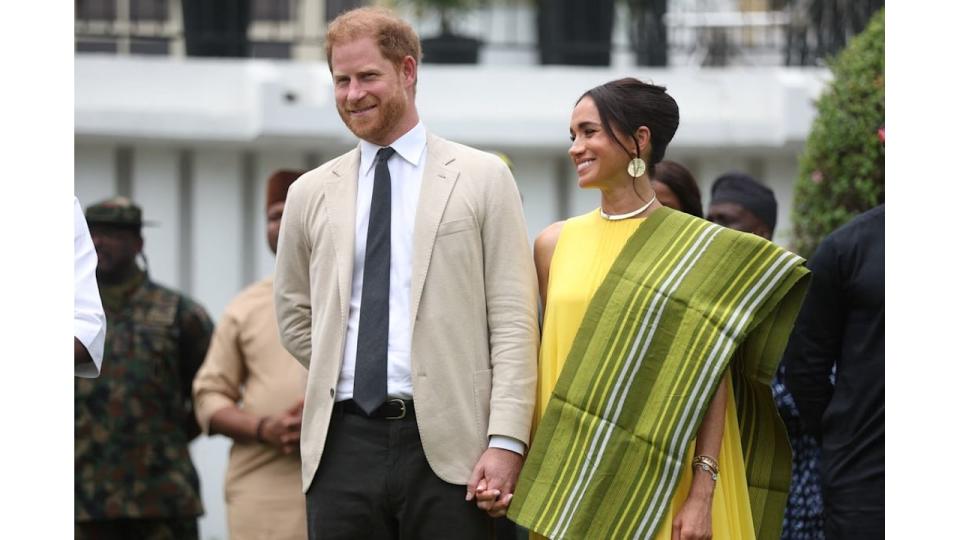 Britain's Prince Harry (2ndR), Duke of Sussex, and  Britain's Meghan (R), Duchess of Sussex, react as Lagos State Governor, Babajide Sanwo-Olu (unseen), gives a speech at the State Governor House in Lagos on May 12, 2024 as they visit Nigeria as part of celebrations of Invictus Games anniversary.