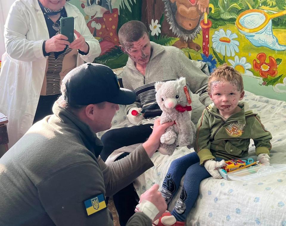 A child is given a plush toy at a hospital in the Donetsk region in Ukraine by Jared Malone.