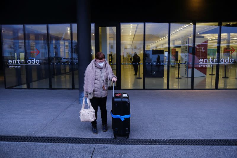 AIDAnova cruise passengers leave Lisbon's port due to an outbreak of the coronavirus among the cruise's crew in Lisbon