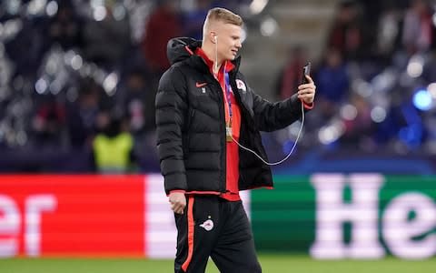 Red Bull Salzburg's Erling Braut Haland inspects the pitch before the UEFA Champions League match at the Red Bull Arena, Salzburg - Credit: PA
