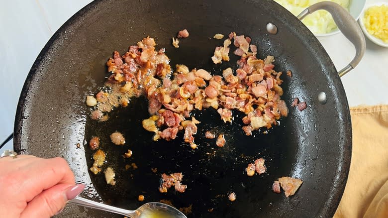 cooking bacon crumbles in pan