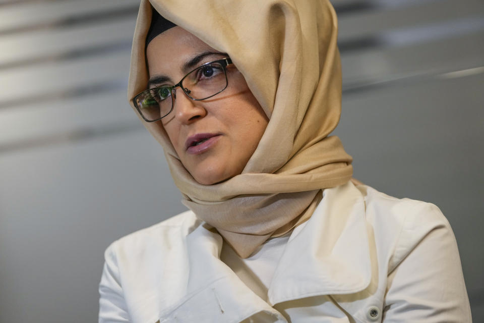 Hatice Cengiz, the fiancee of murdered Saudi journalist Jamal Kashoggi, talks during an interview with The Associated Press in Istanbul, Turkey, Thursday, July 14, 2022. Cengiz described Joe Biden's decision to visit Saudi Arabia as "heartbreaking," accusing the U.S. president on Thursday of backing down from his pledge of prioritizing human rights. (AP Photo/Francisco Seco)