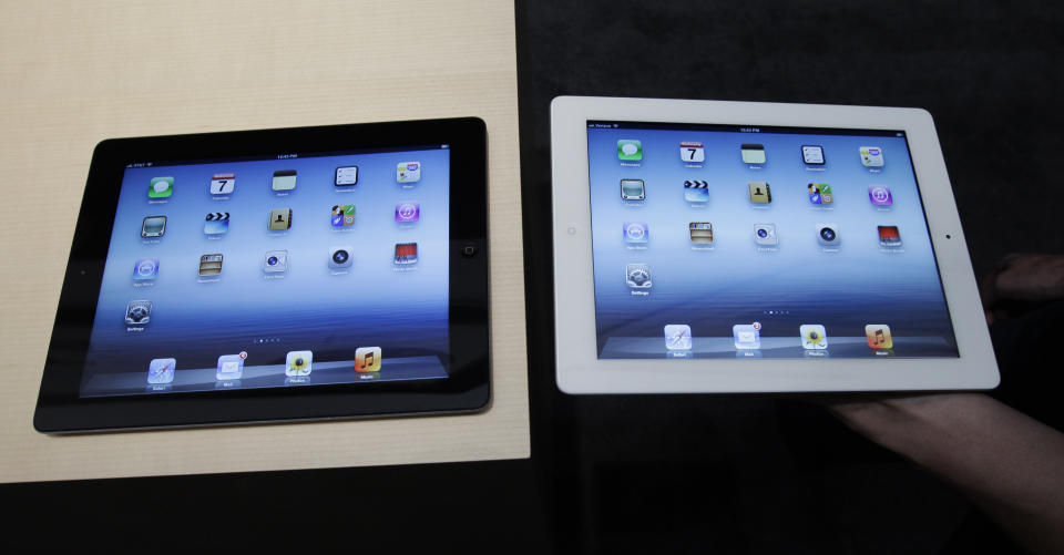 A new Apple iPad is on display during an Apple event in San Francisco, Wednesday, March 7, 2012. The new iPad features a sharper screen and a faster processor. Apple says the new display will be even sharper than the high-definition television set in the living room. (AP Photo/Paul Sakuma)