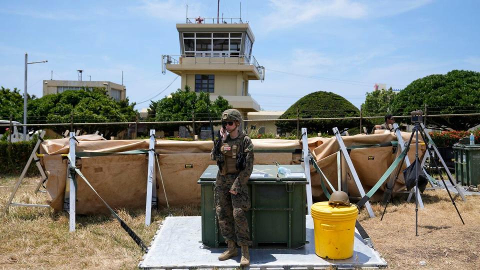 A U.S. soldier stands near the control tower at the Basco airport in the Philippines on May 6, 2024. (Aaron Favila/AP)