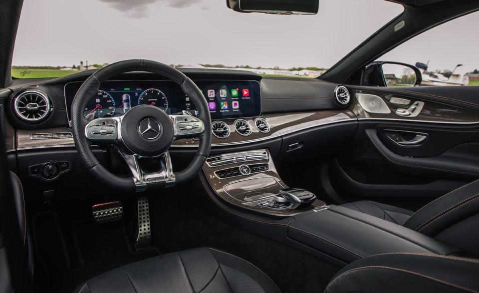 <p>Our example's $21,855 Edition 1 package brought Graphite Grey Metallic paint, a black leather interior with copper stitching, 20-inch matte-black wheels, carbon-fiber interior trim with copper threading, and an IWC clock in the dashboard.</p>