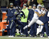 <p>Detroit Lions wide receiver Marvin Jones (11) catches a pass in front of Seattle Seahawks cornerback Jeremy Lane (20) during the first half in the NFC Wild Card playoff football game at CenturyLink Field. Mandatory Credit: Steven Bisig-USA TODAY Sports </p>