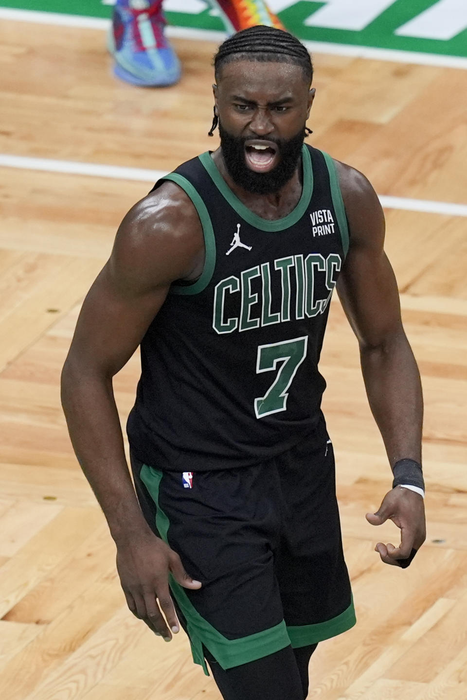 Boston Celtics guard Jaylen Brown (7) reacts after scoring during the first half of Game 2 of the NBA Eastern Conference basketball finals against the Indiana Pacers, Thursday, May 23, 2024, in Boston. (AP Photo/Michael Dwyer)