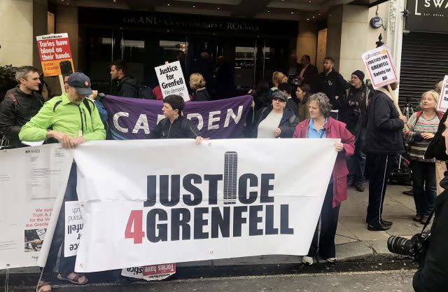 Protesters outside the Grenfell Tower public inquiry (Jack Hardy/PA)