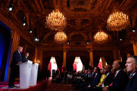 <p>French President Emmanuel Macron (2nd L) and President Donald Trump (L) hold a press conference following meetings at the Elysee Palace in Paris, on July 13, 2017. (Photo: Saul Loeb/AFP/Getty Images) </p>