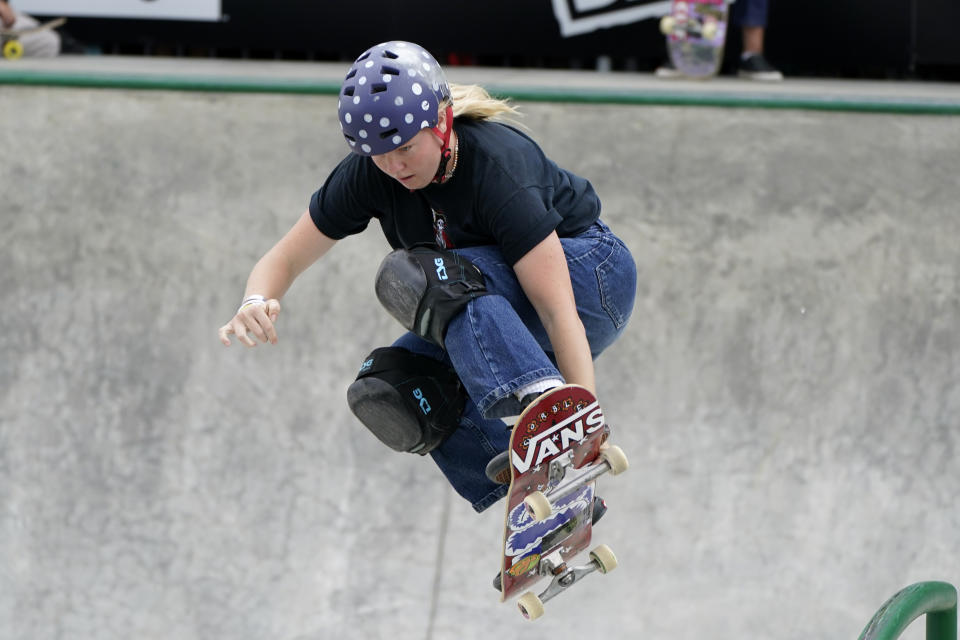 FILE - In this May 21, 2021, file photo, Poppy Starr Olsen, of Brazil, practices for the Olympic qualifying skateboard event at Lauridsen Skatepark in Des Moines, Iowa. After taking a year off due to the coronavirus pandemic, X Games is returning to its roots. BMX, Moto X and skateboarding will be contested at three Southern California training locations, including Axell Hodges' "Slayground" outside of San Diego and Pat Casey's "Dreamyard" in Riverside. Olsen is among the invited athletes at the event. (AP Photo/Charlie Neibergall, File)
