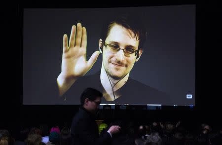 Former U.S. National Security Agency contractor Edward Snowden appears live via video during a student organized world affairs conference at the Upper Canada College private high school in Toronto, February 2, 2015. REUTERS/Mark Blinch