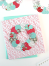 <p>Punch out circles in a few festive patterns, and you've got yourself the beginnings of a festive holiday wreath! The wreaths are so simple to make, you can use them as gift toppers, ornaments or decorations in addition to cards.</p><p><em><a href="https://www.whitehousecrafts.net/post/2017/11/14/holiday-paper-wreaths" rel="nofollow noopener" target="_blank" data-ylk="slk:Get the tutorial at White House Crafts »;elm:context_link;itc:0;sec:content-canvas" class="link ">Get the tutorial at White House Crafts »</a></em><br></p>