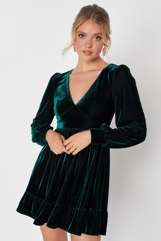 <p><a href="https://go.redirectingat.com?id=74968X1596630&url=https%3A%2F%2Fwww.lulus.com%2Fproducts%2Fposh-prestige-emerald-green-velvet-long-sleeve-cutout-mini-dress%2F2205476.html&sref=https%3A%2F%2Fwww.thepioneerwoman.com%2Fholidays-celebrations%2Fg41695178%2Fchristmas-outfits%2F" rel="nofollow noopener" target="_blank" data-ylk="slk:Shop Now;elm:context_link;itc:0;sec:content-canvas" class="link rapid-noclick-resp">Shop Now</a></p><p>Posh Prestige Emerald Green Velvet Dress</p><p>lulus.com</p><p>$76.00</p><span class="copyright">Lulu's</span>