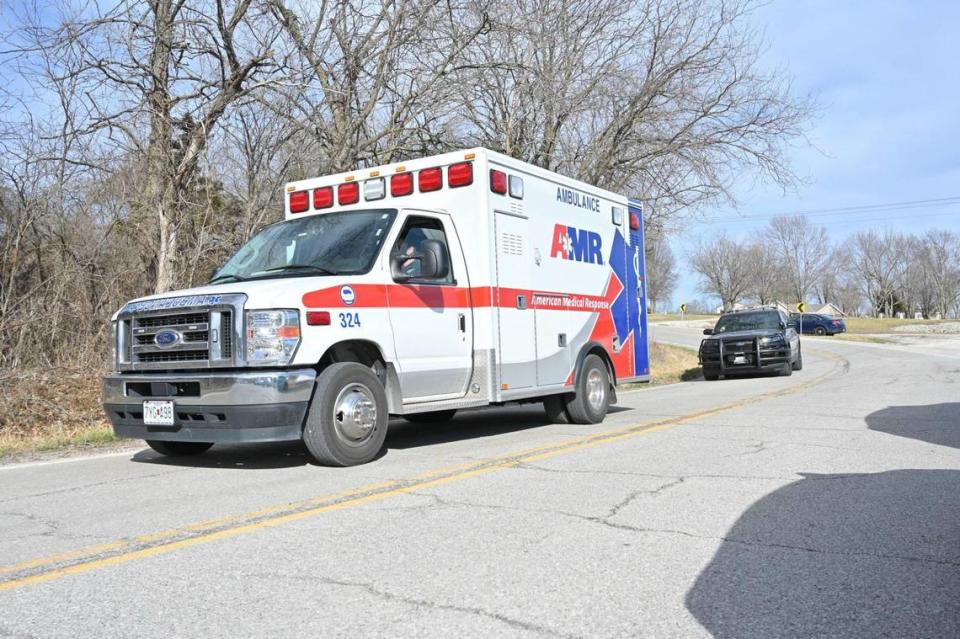 An ambulance and a police car leave the scene near Missouri 7 Highway and Bundschu Road in Independence Thursday, Feb. 29, 2024, after multiple police officers were reported shot in the area.