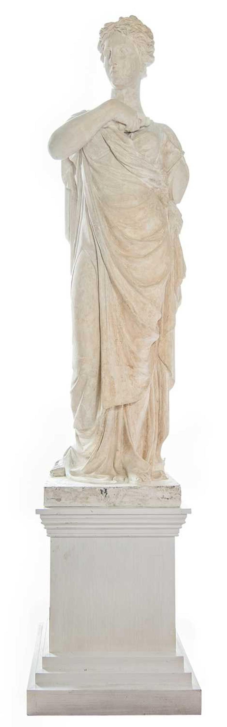 A plaster figure estimated to become the auction’s biggest sale (Lay’s Auctioneers)