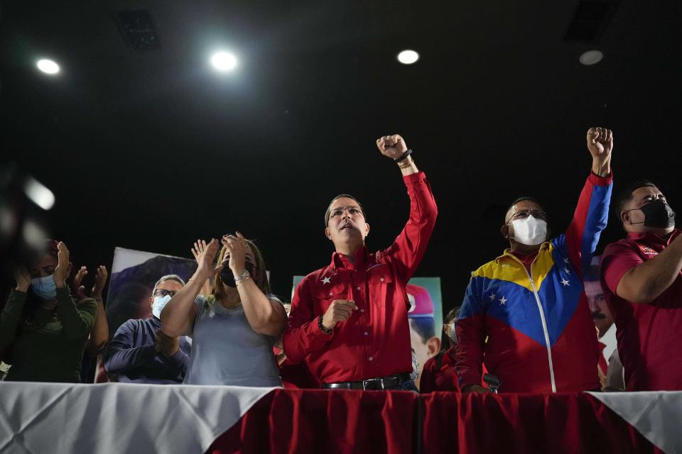 Former Foreign Minister Jorge Arreaza, of the ruling socialist party, gives a press conference to concede the previous day's gubernatorial re-run election to opposition candidate Sergio Garrido in Barinas, Venezuela, Monday Jan. 10, 2022. (AP Photo/Matias Delacroix)