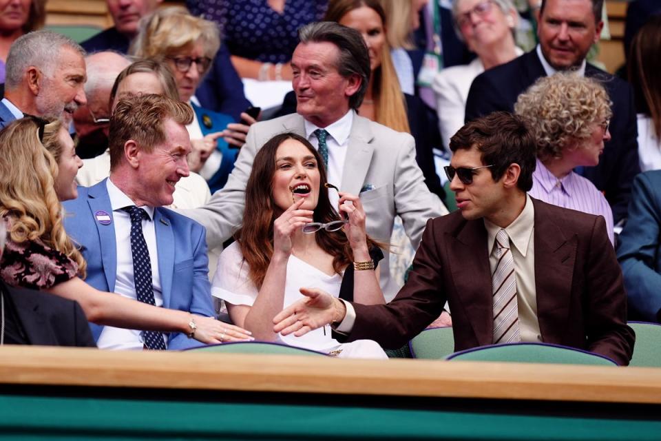 Keira Knightley and James Righton in the royal box with former tennis player Mark Woodforde (PA Wire)