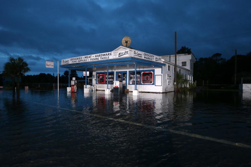 Bo Lynn's Grocery store rests partially underwater in St. Marks in the hours after Hurricane Hermine passed through on Sept. 2. Waters overnight rose to a few feet within the store.