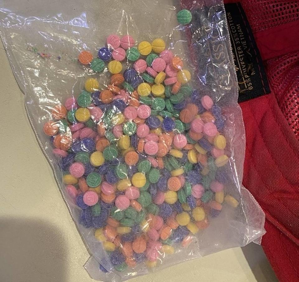 A photograph of rainbow-colored fentanyl pills seized in November 2022 as part of an investigation into a drug trafficking network operating in Whatcom and Skagit counties.