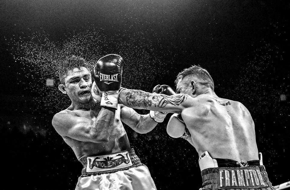 <p>Carl Frampton, right, in action against Horacio Garcia during their featherweight bout at the SSE Arena in Belfast. (Photo By Ramsey Cardy/Sportsfile via Getty Images) </p>