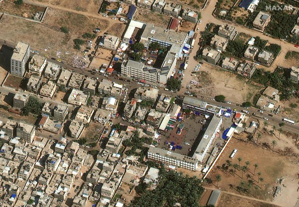 Satellite images show Palestinians sheltering at school along Akkela street  in Gaza City (Satellite image Â©2023 Maxar Tech)